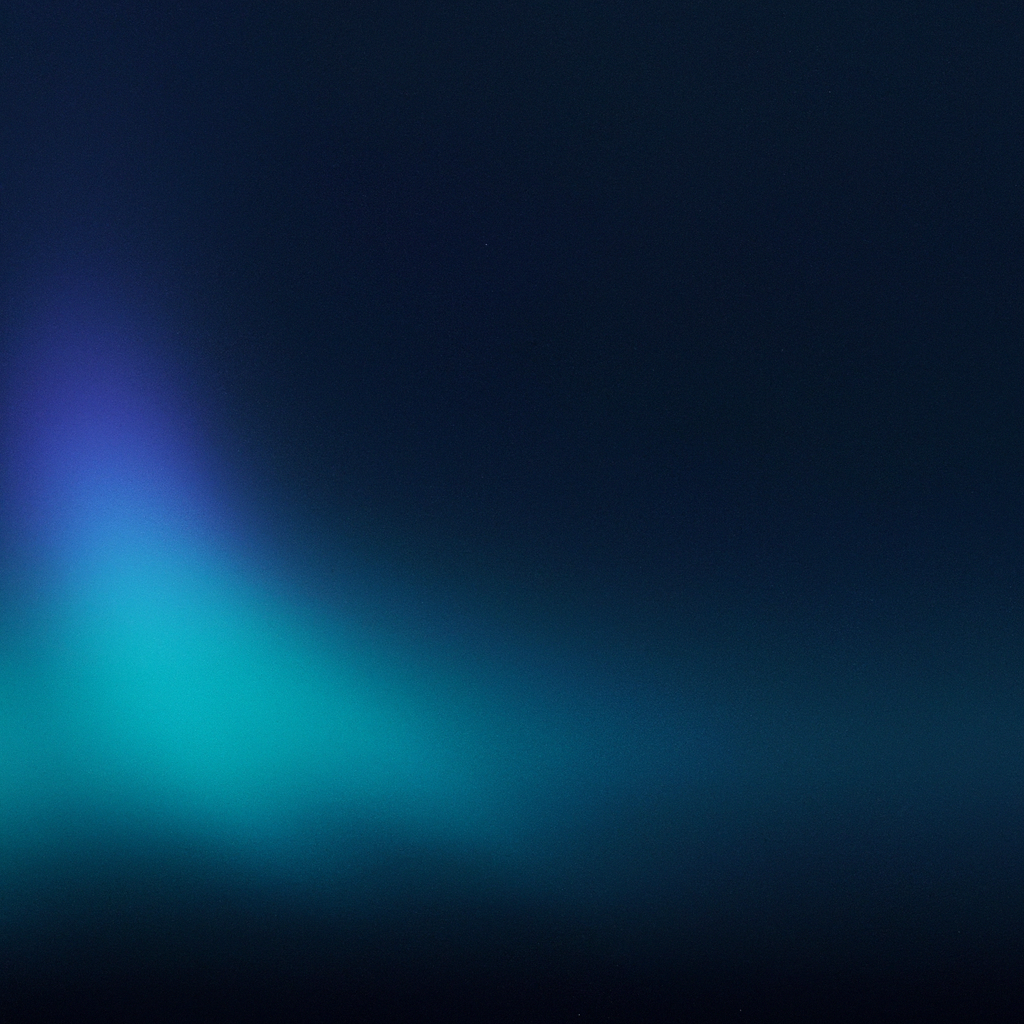 Abstract northern lights gradient flowing across a dark sky
